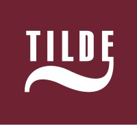 Tilde ~